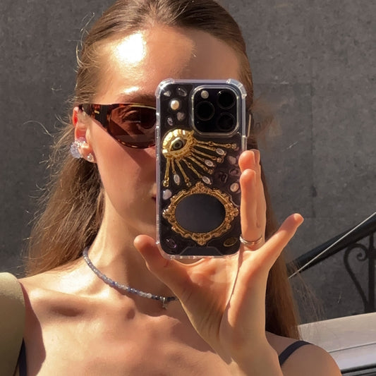 Golden eye with mirror