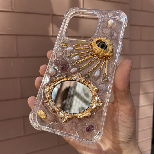 Golden eye with mirror