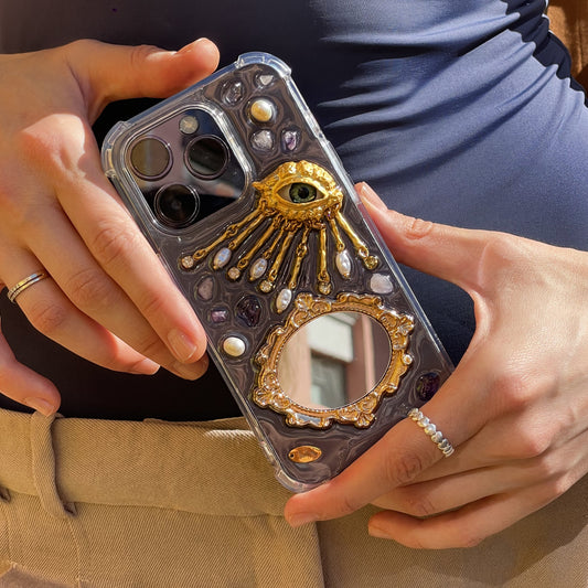 Golden eye with mirror